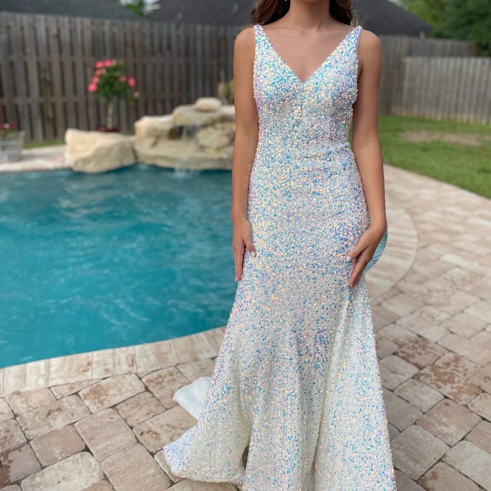 Sherri Hill 
Sequin Gown
Size 6 altered to fit a size 2.